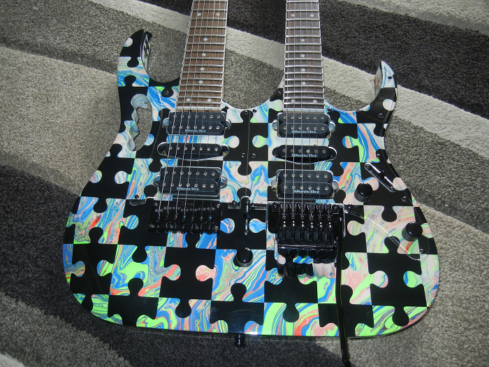 Jem Swirl Double Neck Black Puzzle Image