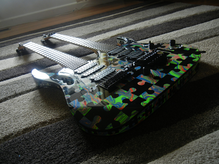 Jem Swirl Double Neck Black Puzzle Image