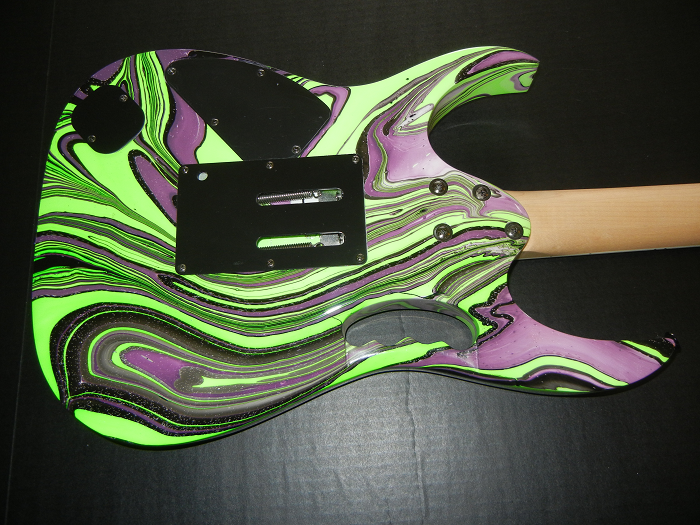 Jem Swirl Green Black And Purple Image