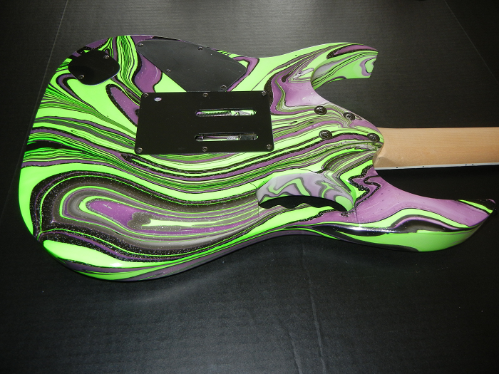 Jem Swirl Green Black And Purple Image